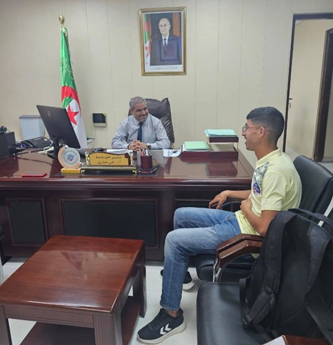 لقاء مدير الجامعة بالطالب الرياضي فخر الدين ثلايجية